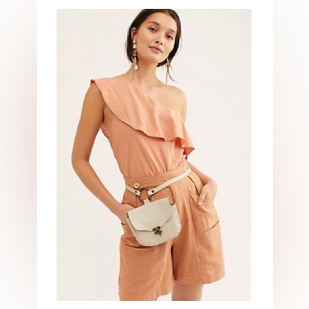 Happy Hour Bodysuit by Free People. Size Small. Color Peach.